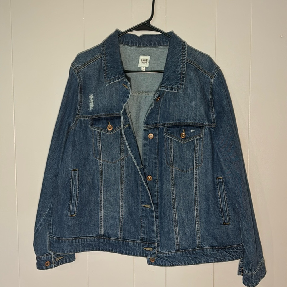 Distressed jean jacket